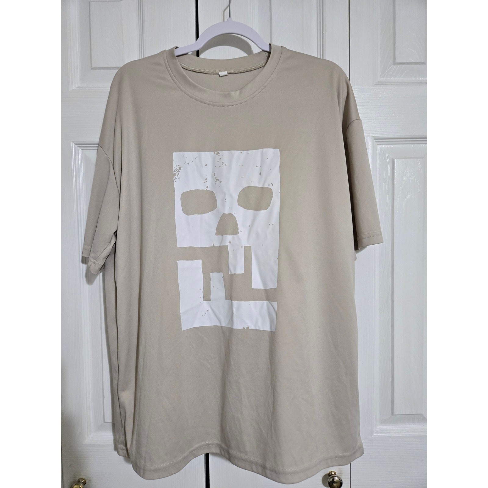 Unknown brand large men’s cream colored tshirt