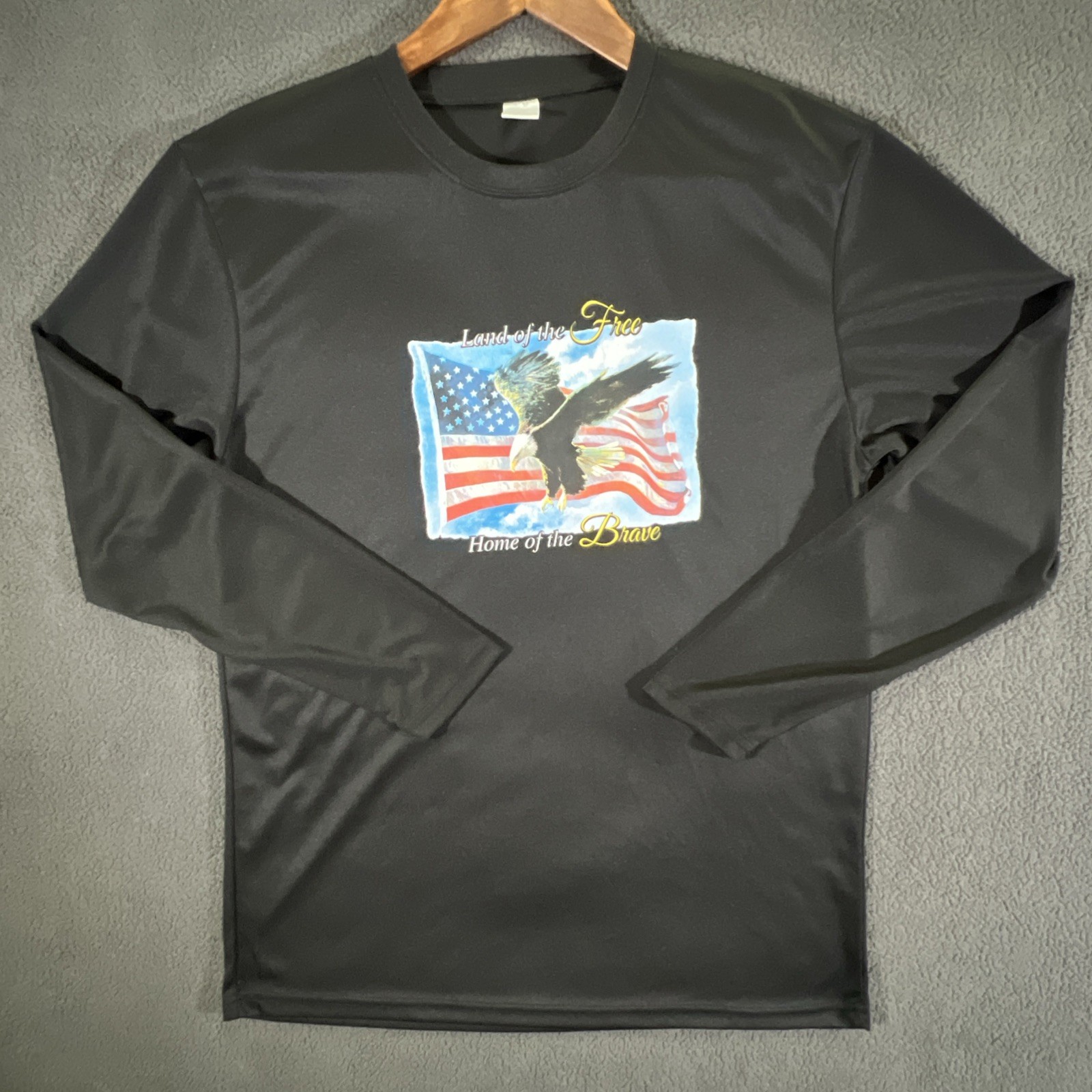 Land of the Free Home Brave Men’s Size Large Black Long Sleeve Performance Shirt