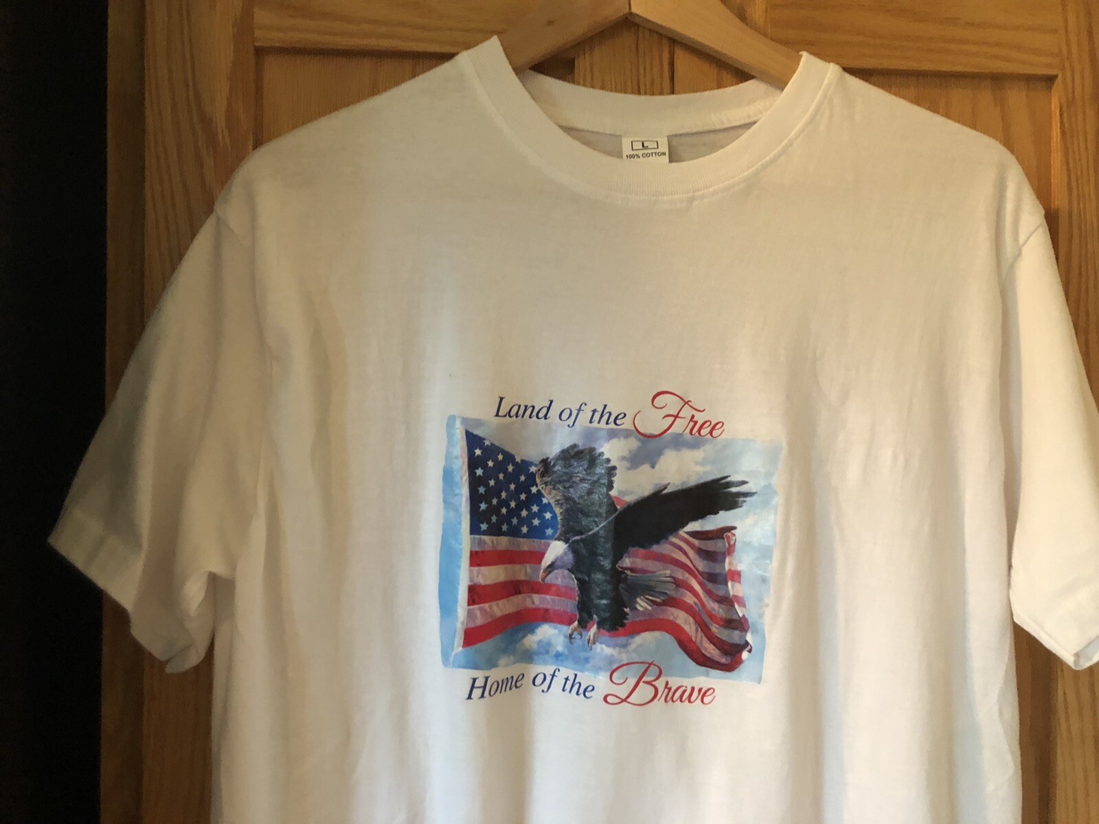 LAND OF THE FREE HOME OF THE BRAVE TSHIRT WHITE SIZE LARGE