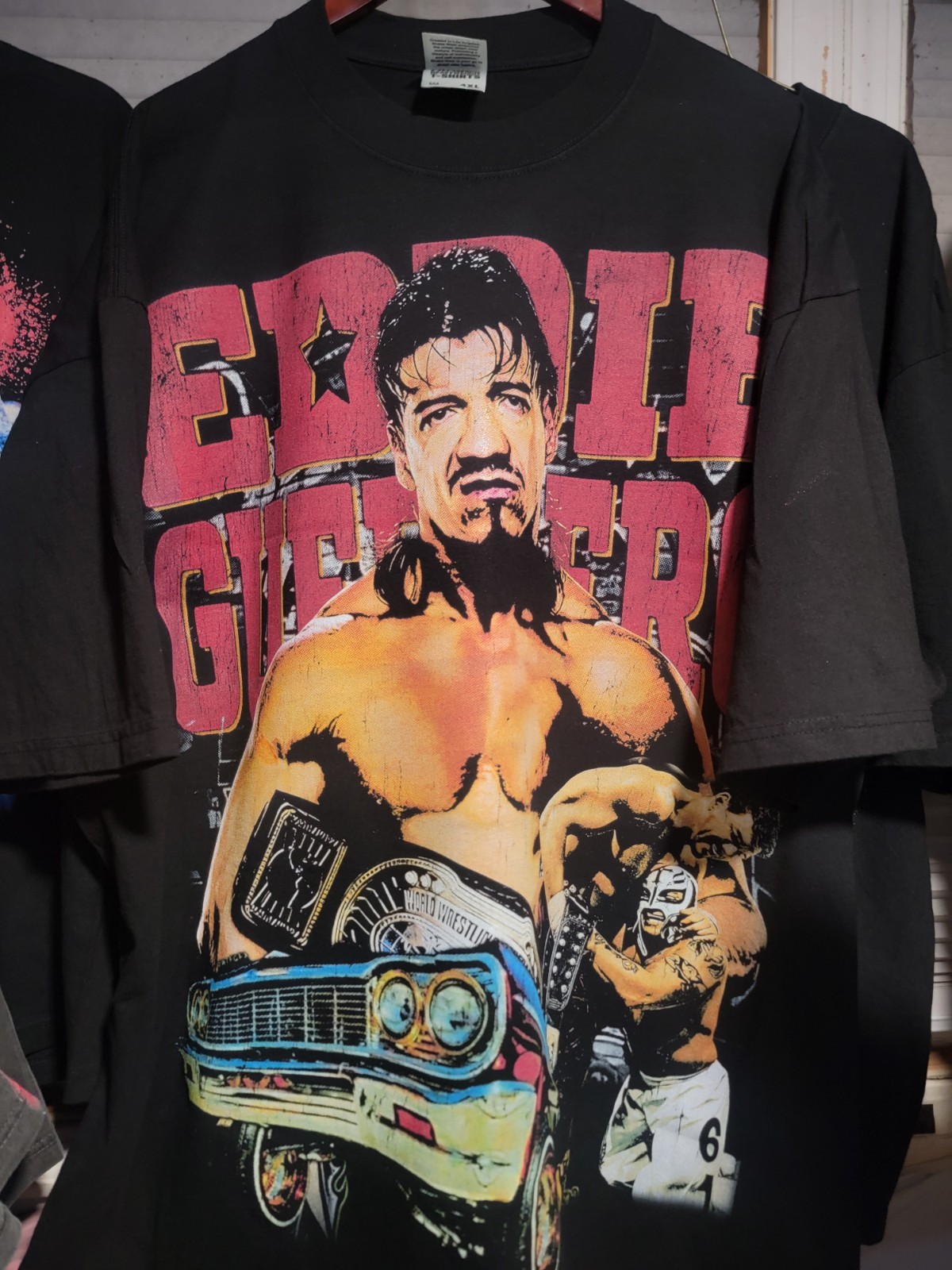 EDDIE GUERRERO LATINO HEAT ON A SHAKA HEAVYWEIGHT GARMET DYED T SHIRT “MODERN”