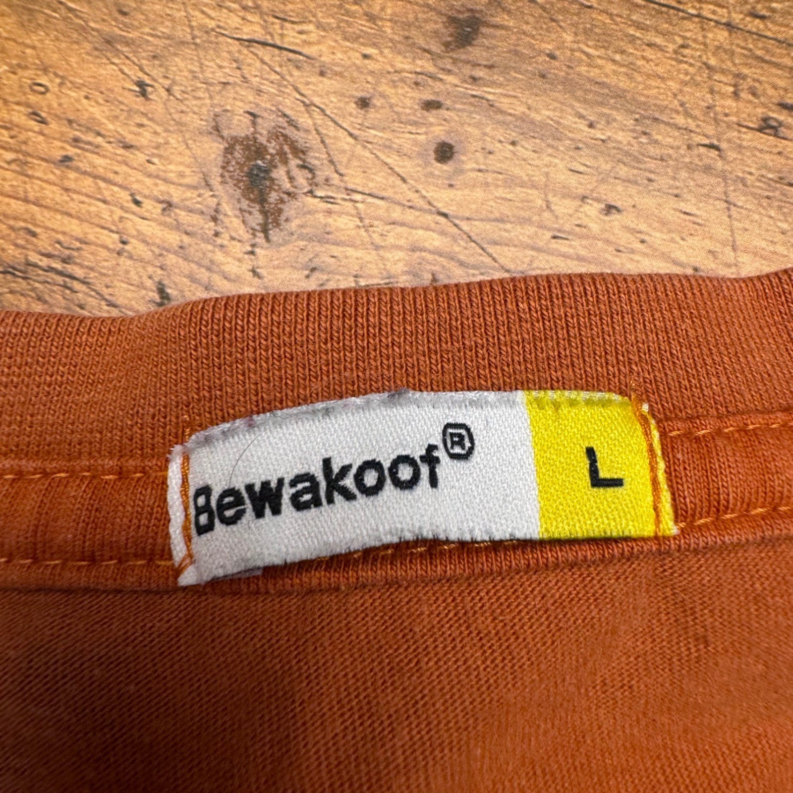 Bewakoof Burnt Orange Peeking Eyes Graphic T-Shirt Mens Large Short Sleeve Tee
